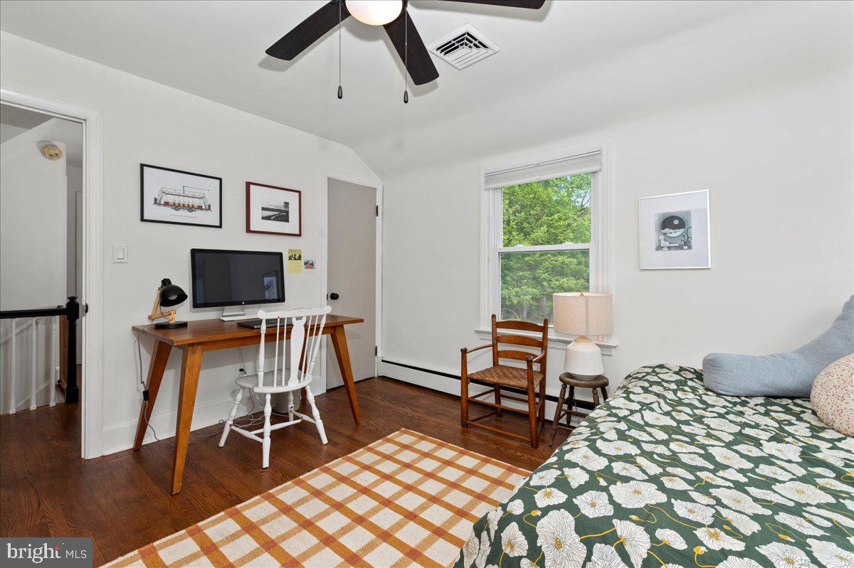 1708 Wrightfield Road Yardley, PA 19067 - Photo 26 of 41 a living room with furniture a flat screen tv and a window