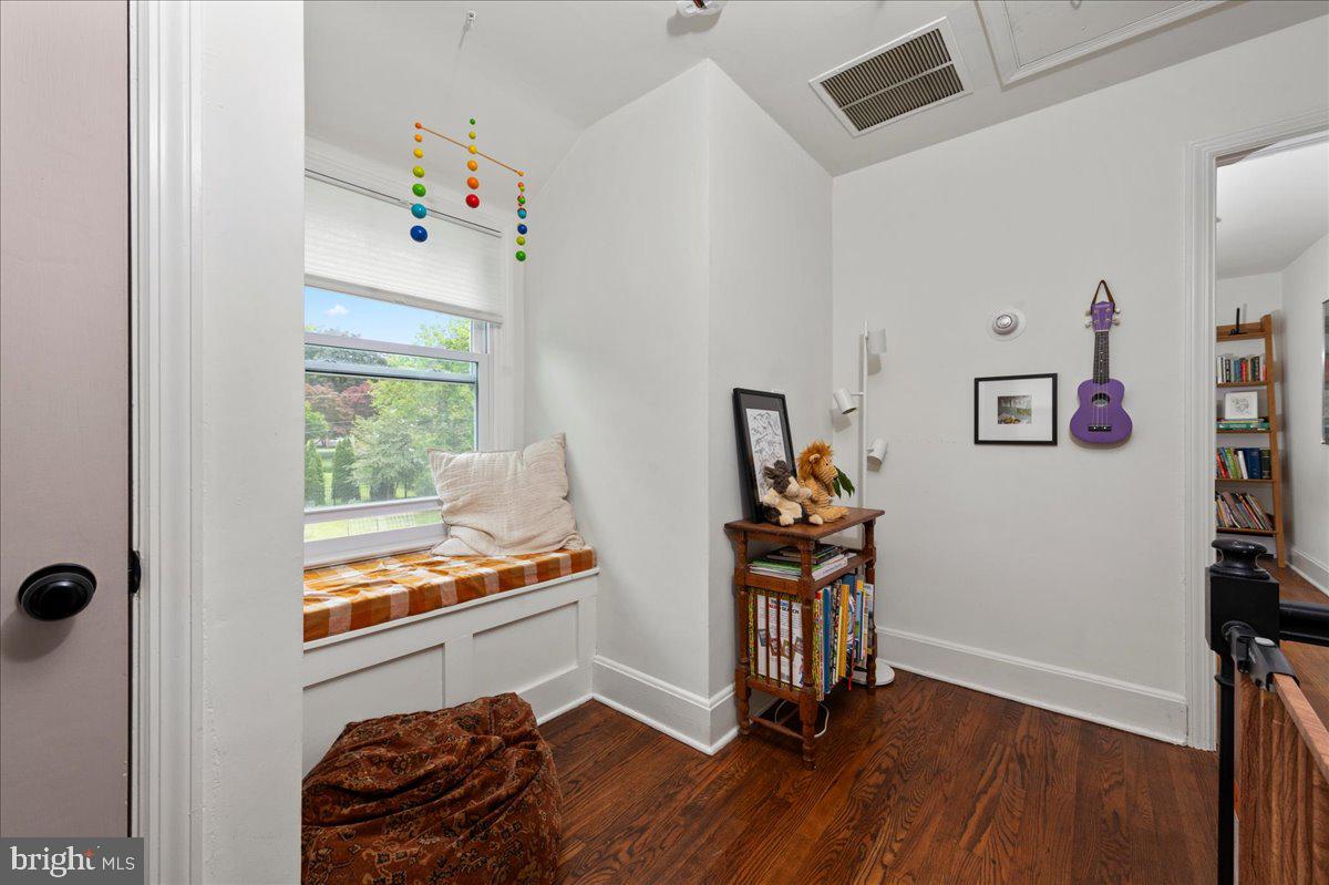 1708 Wrightfield Road Yardley, PA 19067 - Photo 30 of 41 a room with furniture and wooden floor