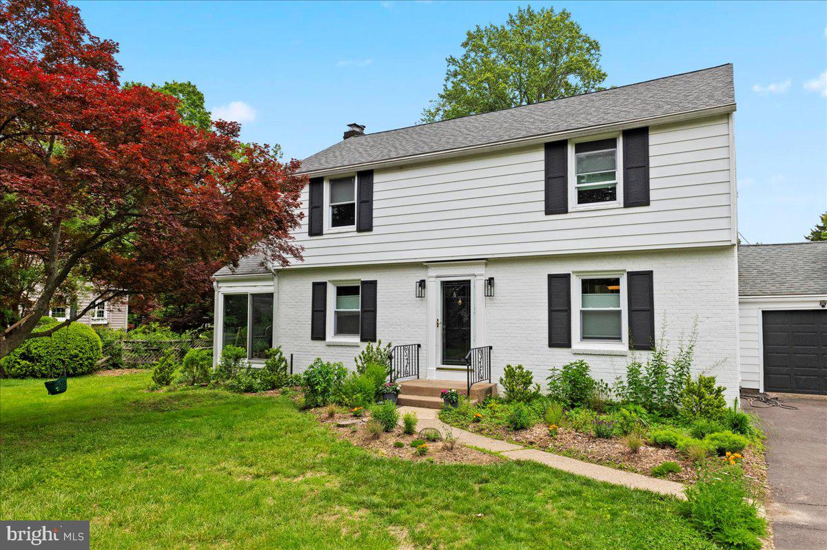 1708 Wrightfield Road Yardley, PA 19067 - Photo 3 of 41 a front view of a house with a yard and trees