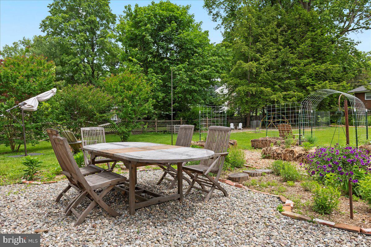 1708 Wrightfield Road Yardley, PA 19067 - Photo 31 of 41 a view of a table and chairs in the garden