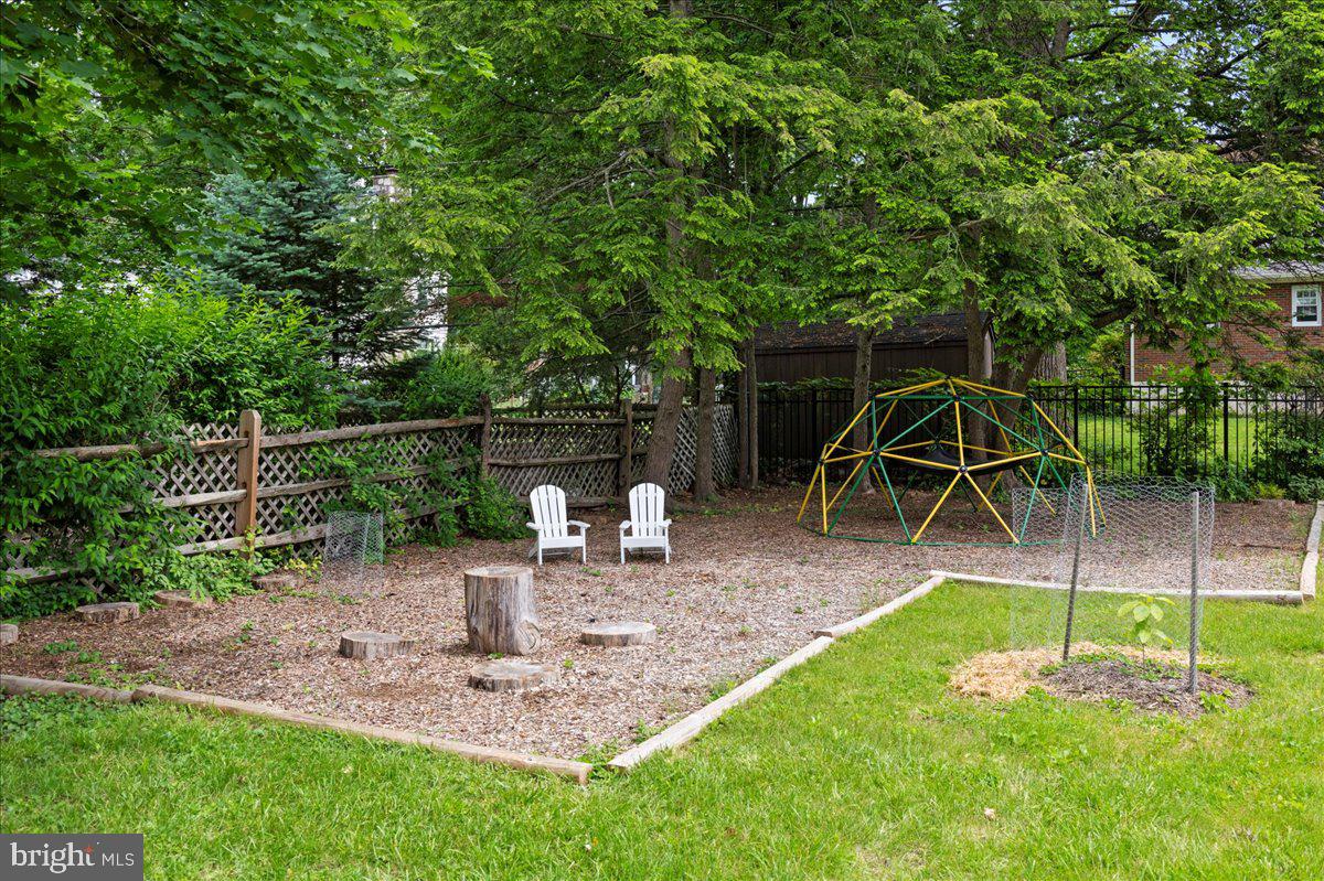 1708 Wrightfield Road Yardley, PA 19067 - Photo 33 of 41 a view of a backyard with swings