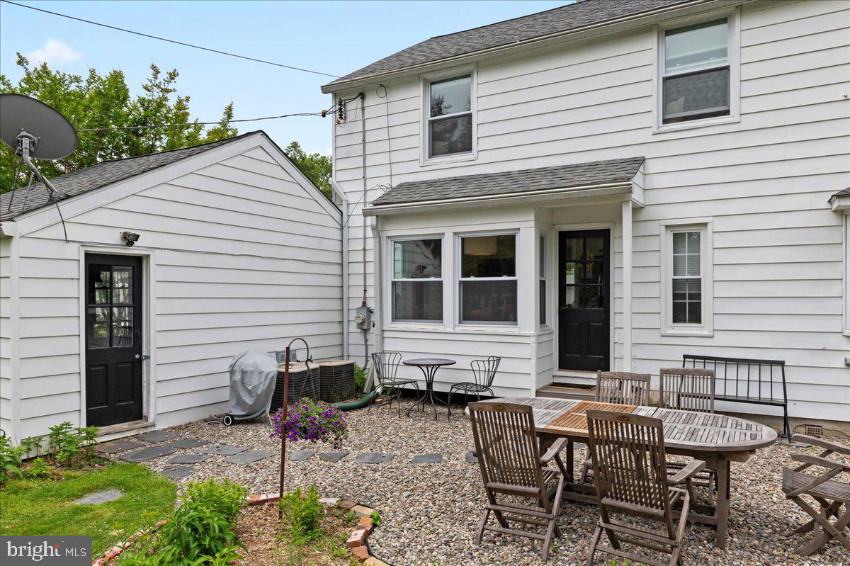 1708 Wrightfield Road Yardley, PA 19067 - Photo 40 of 41 a backyard of a house with yard fire pit and chairs