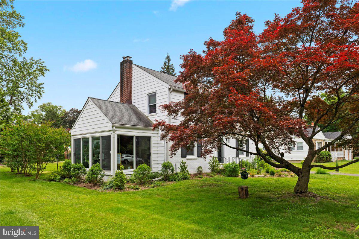 1708 Wrightfield Road Yardley, PA 19067 - Photo 41 of 41 a front view of a house with a garden and trees