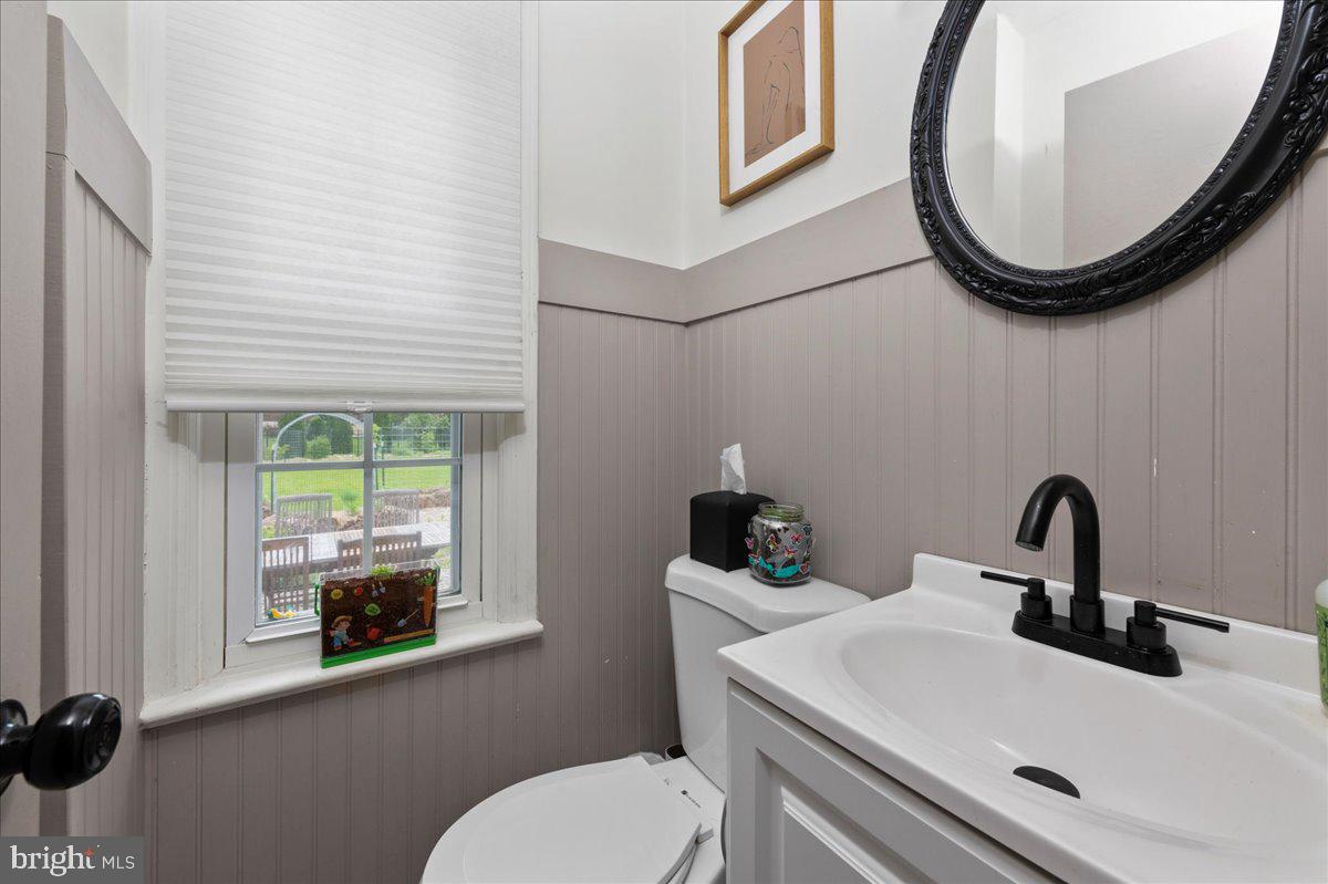 1708 Wrightfield Road Yardley, PA 19067 - Photo 9 of 41 a bathroom with a toilet sink and mirror