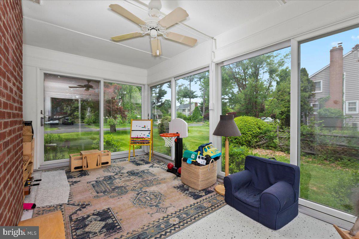 1708 Wrightfield Road Yardley, PA 19067 - Photo 10 of 41 a living room filled with furniture and a floor to ceiling window