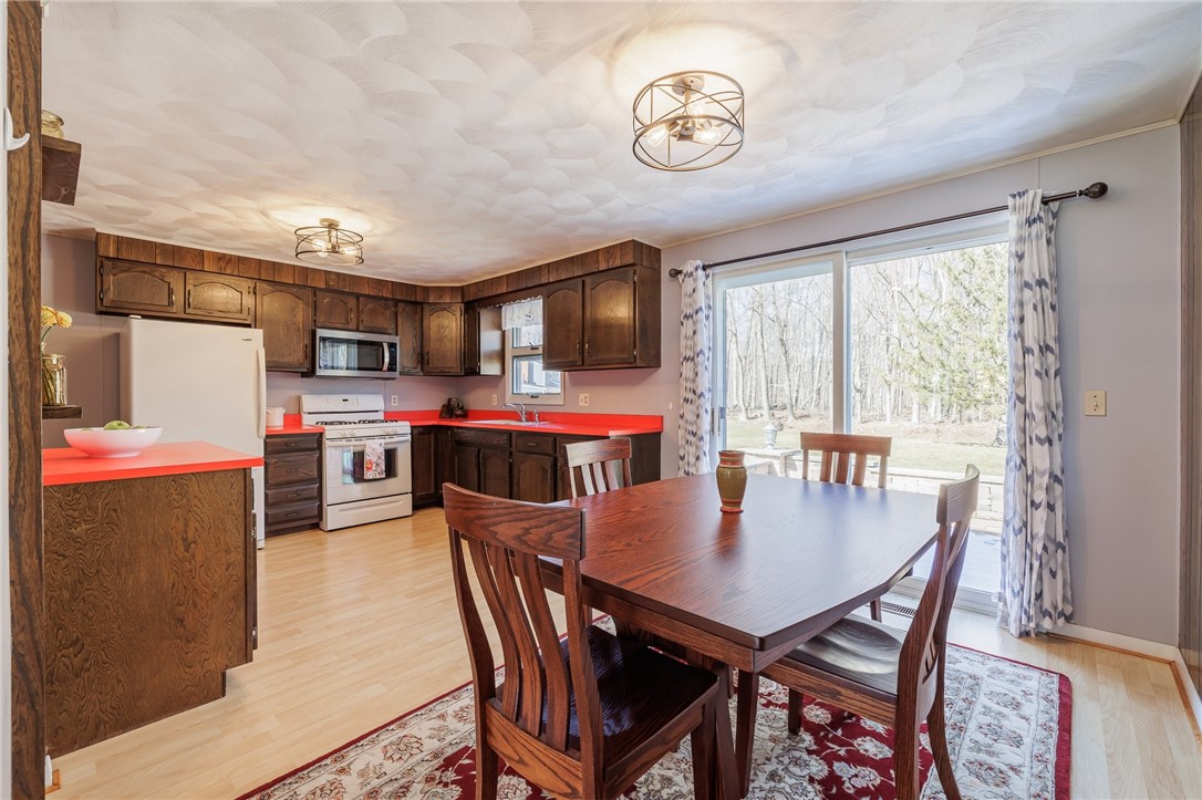 918 Copper Kettle Road Webster, NY 14580 - Photo 12 of 30 Large, eat-in kitchen with sliding door leading to