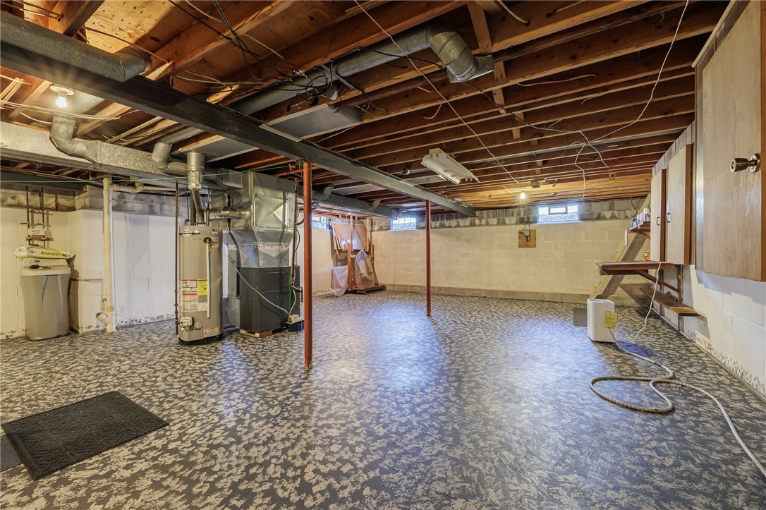 918 Copper Kettle Road Webster, NY 14580 - Photo 24 of 30 Glass block windows! Hot water tank (new in 2020)