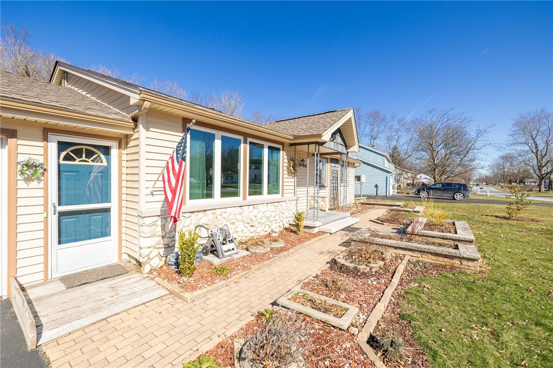918 Copper Kettle Road Webster, NY 14580 - Photo 3 of 30 Lovely walkway and landscaping beds.