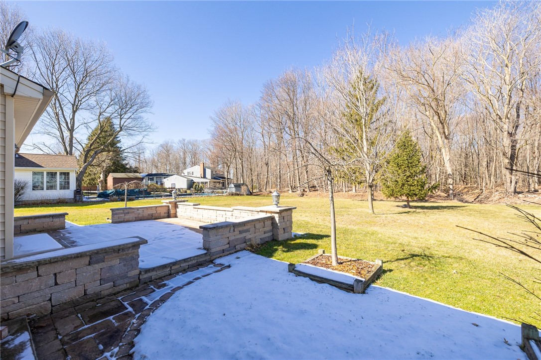918 Copper Kettle Road Webster, NY 14580 - Photo 6 of 30 Umbrio Block Patio with Chapel Stone Block Columns