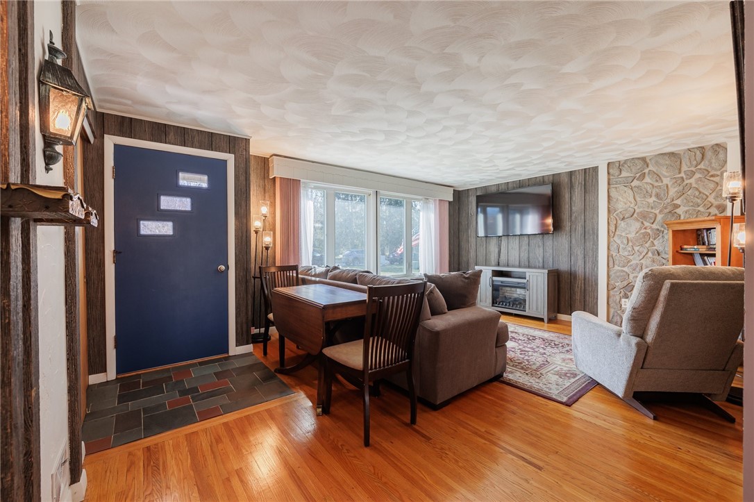 918 Copper Kettle Road Webster, NY 14580 - Photo 8 of 30 Living room with gorgeous hardwood floors and slat