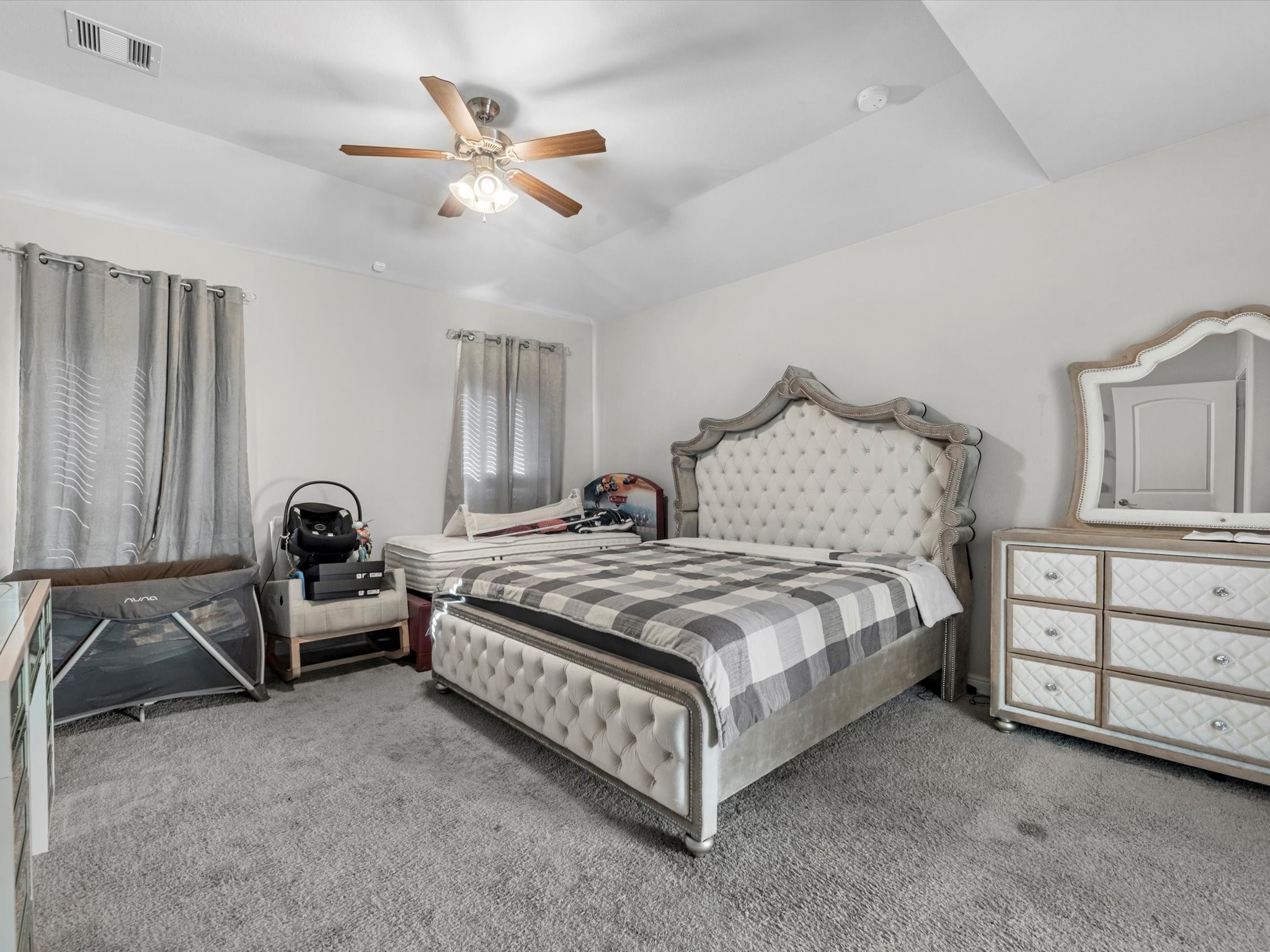 2822 Knotty Frst Drive Spring, TX 77373 - Photo 17 of 29 a spacious bedroom with a bed and furniture