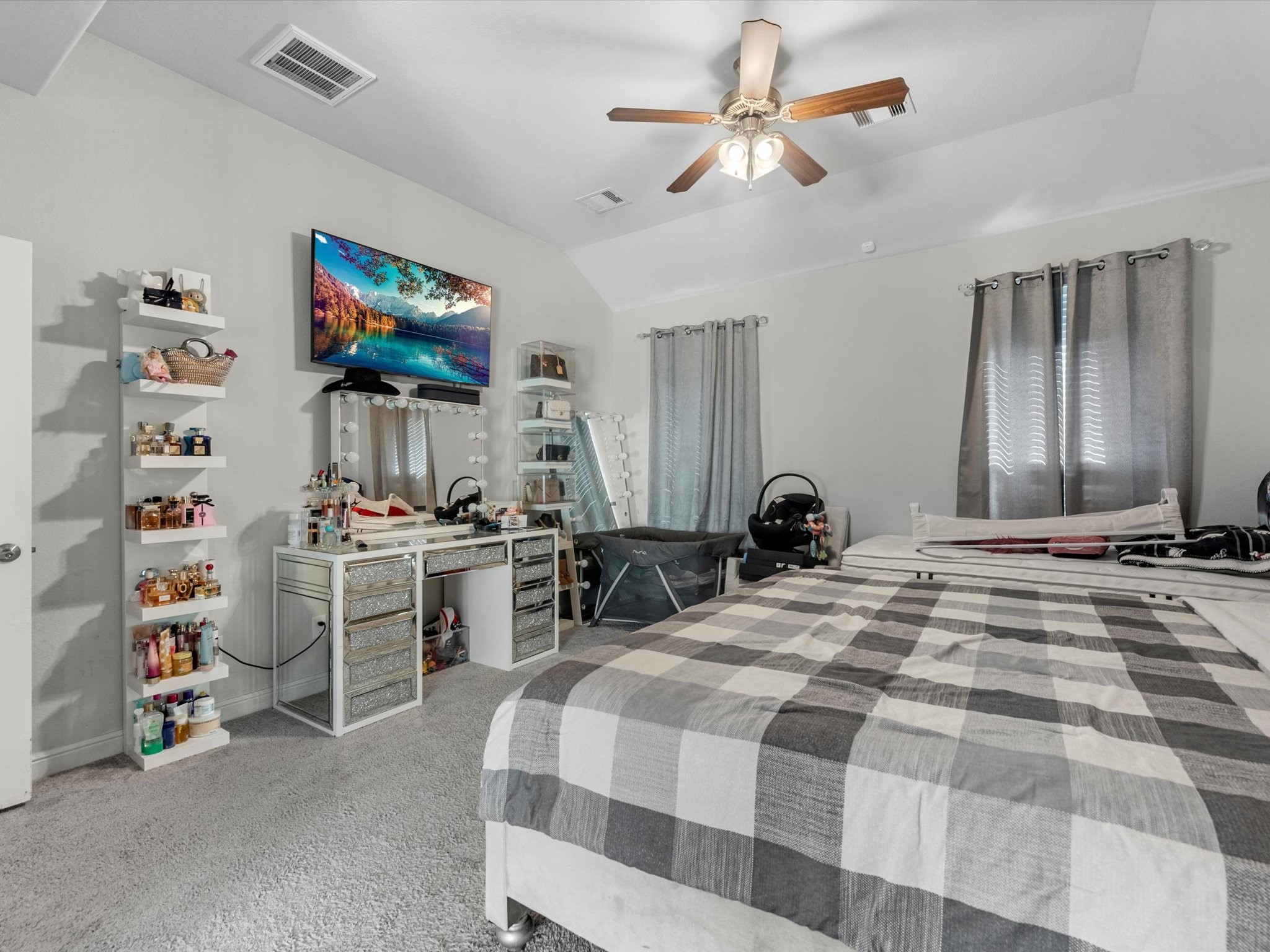 2822 Knotty Frst Drive Spring, TX 77373 - Photo 18 of 29 a bedroom with a bed and a flat screen tv