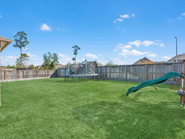 a view of a garden with a slide
