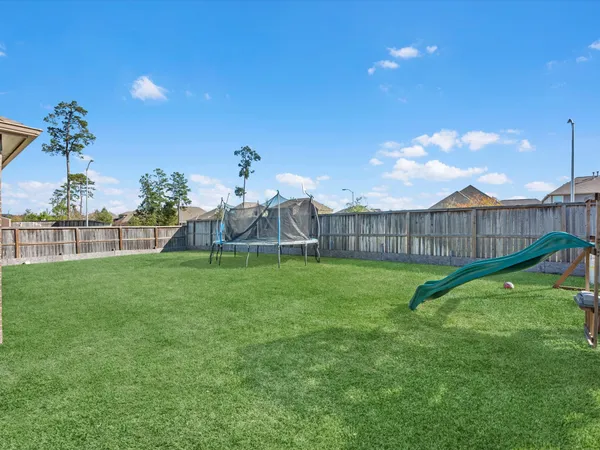 a view of a garden with a slide