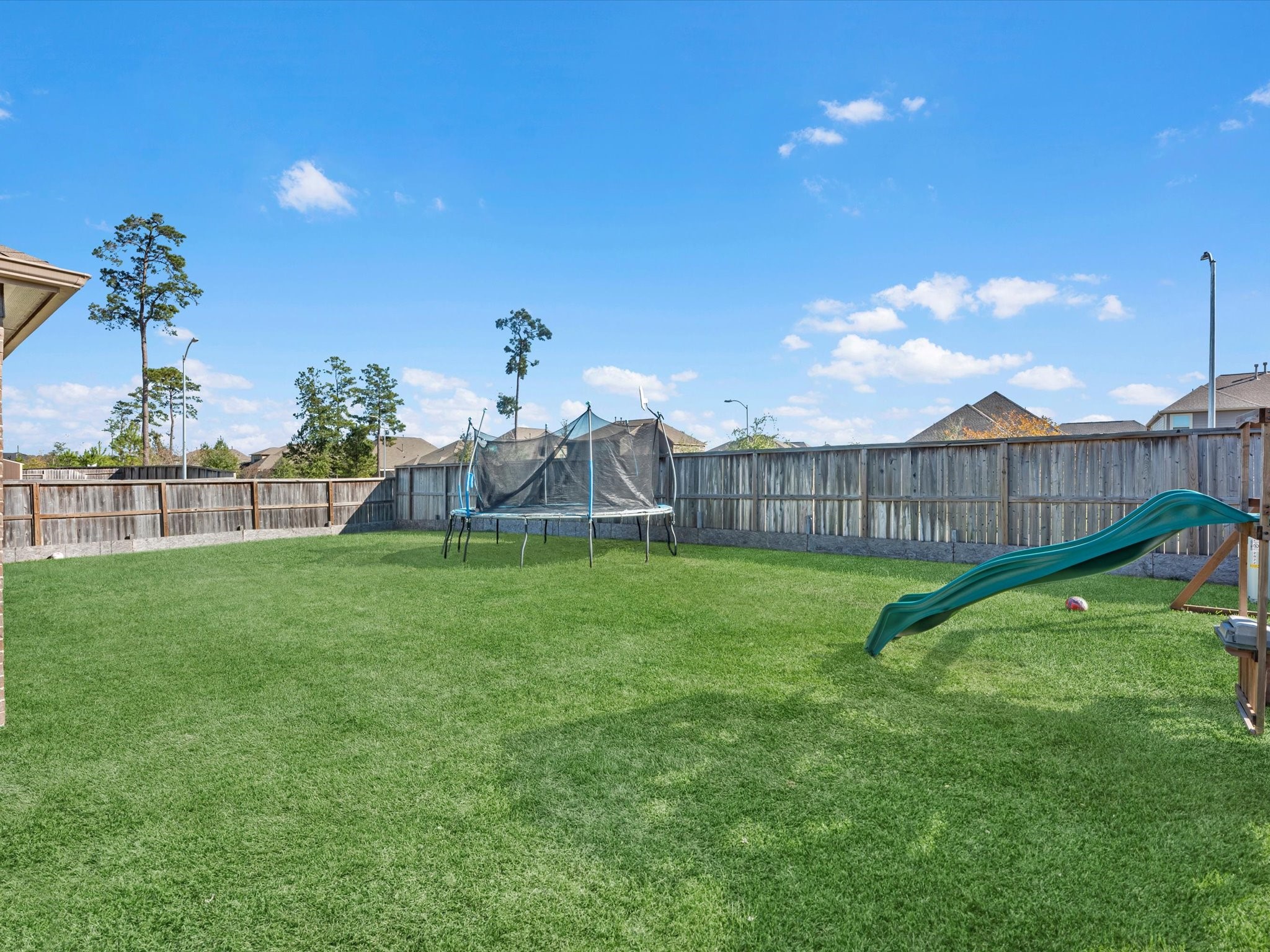 2822 Knotty Frst Drive Spring, TX 77373 - Photo 29 of 29 a view of a garden with a slide