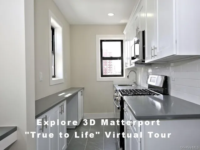 a kitchen with a sink cabinets and window