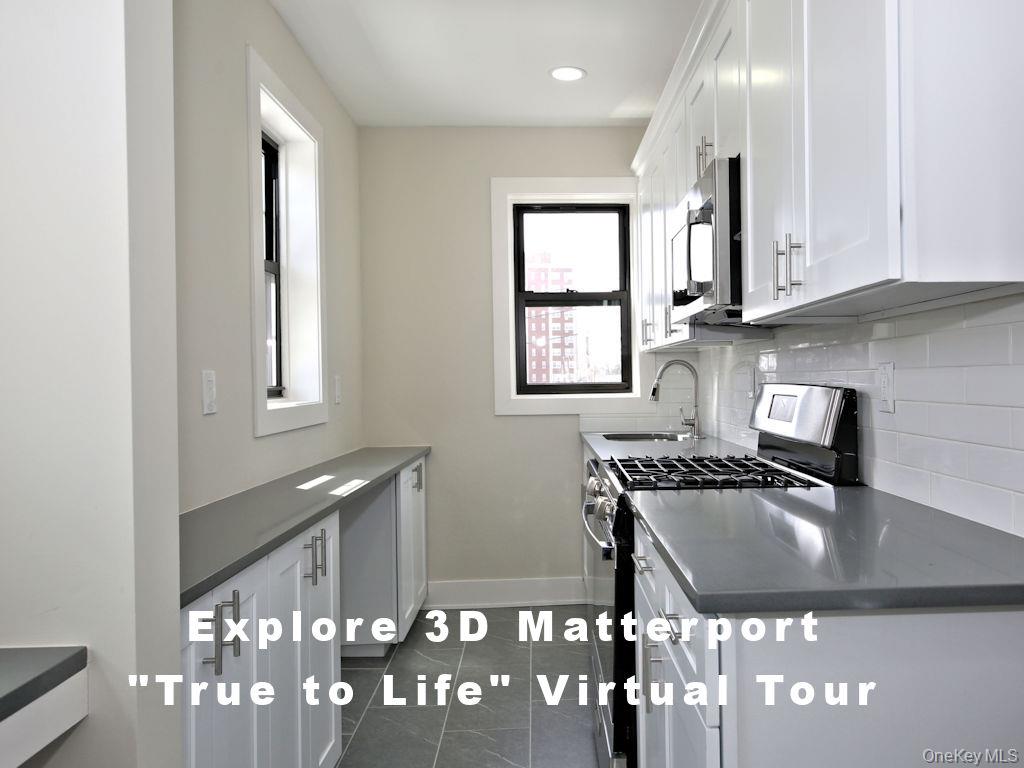 a kitchen with a sink cabinets and window