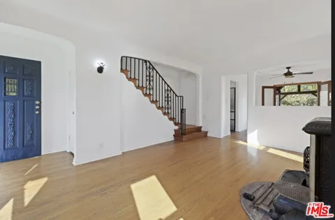 a view of an entryway with livingroom