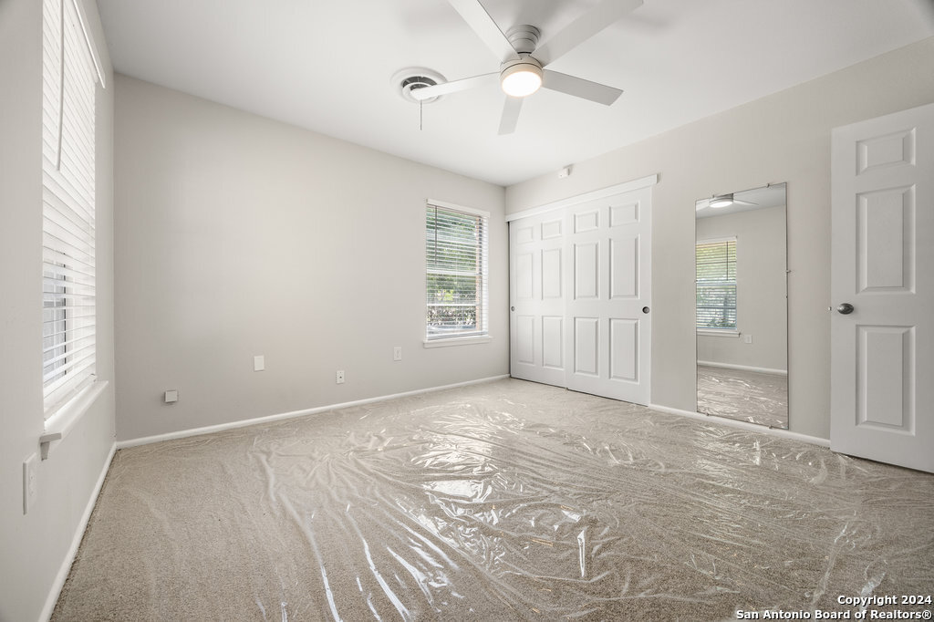 221 Windcrest Drive Windcrest, TX 78239 - Photo 16 of 28 a view of an empty room with a window