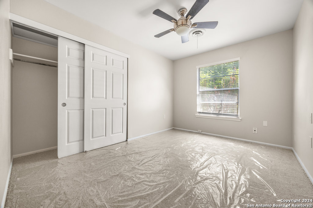 221 Windcrest Drive Windcrest, TX 78239 - Photo 17 of 28 a view of an empty room with a window