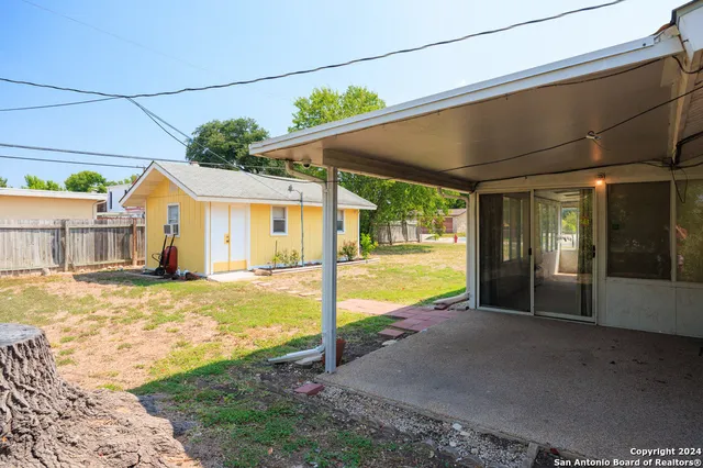 a view of a house with swimming pool
