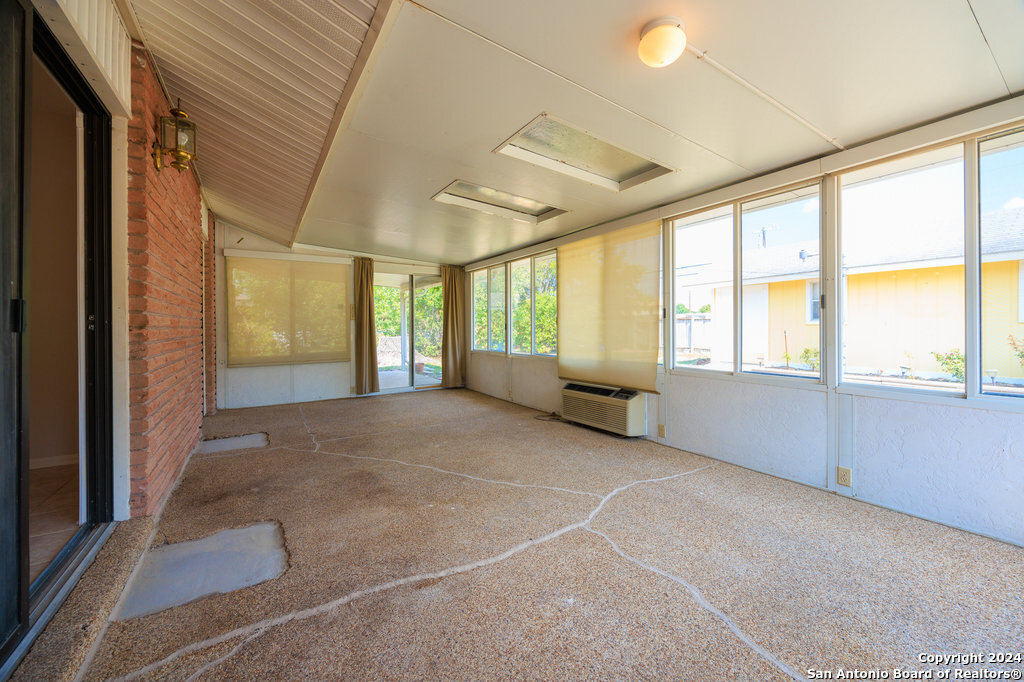 221 Windcrest Drive Windcrest, TX 78239 - Photo 24 of 28 a view of an empty room with a window