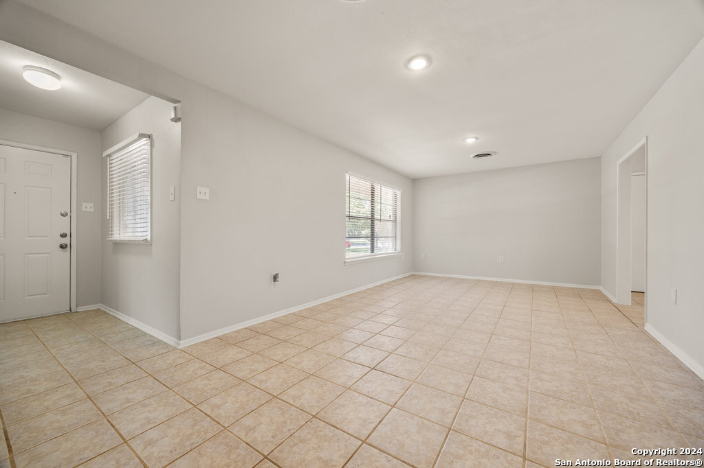 221 Windcrest Drive Windcrest, TX 78239 - Photo 6 of 28 a view of an empty room with window