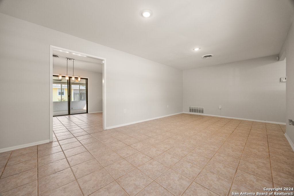 221 Windcrest Drive Windcrest, TX 78239 - Photo 7 of 28 a view of an empty room and window
