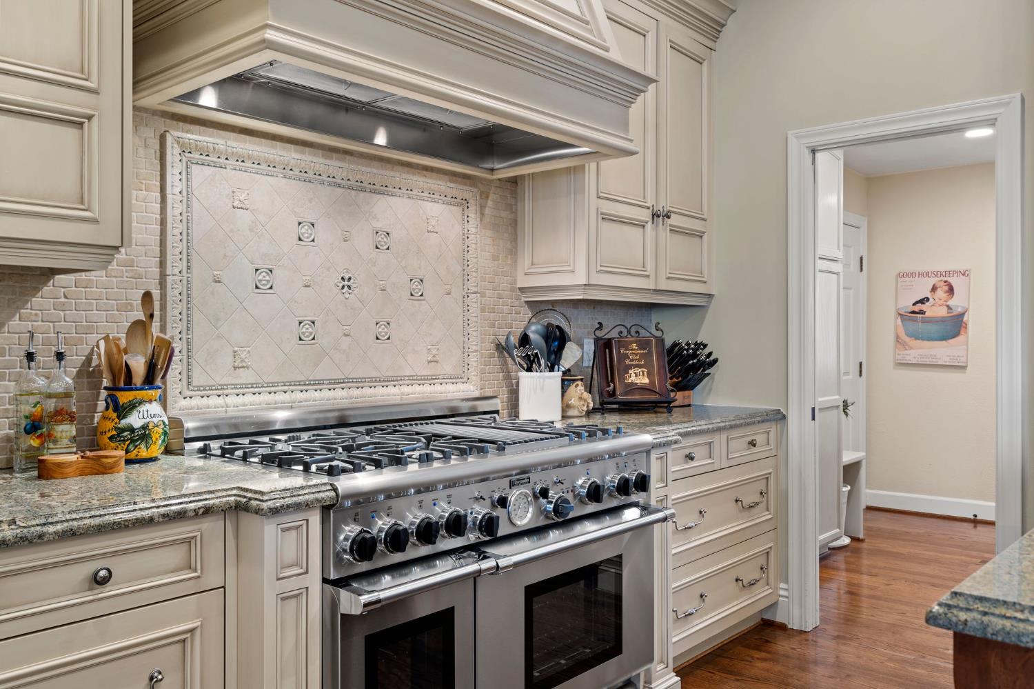 10676 Wilton Road Elk Grove, CA 95624 - Photo 27 of 71 a white stove top oven sitting inside of a kitchen