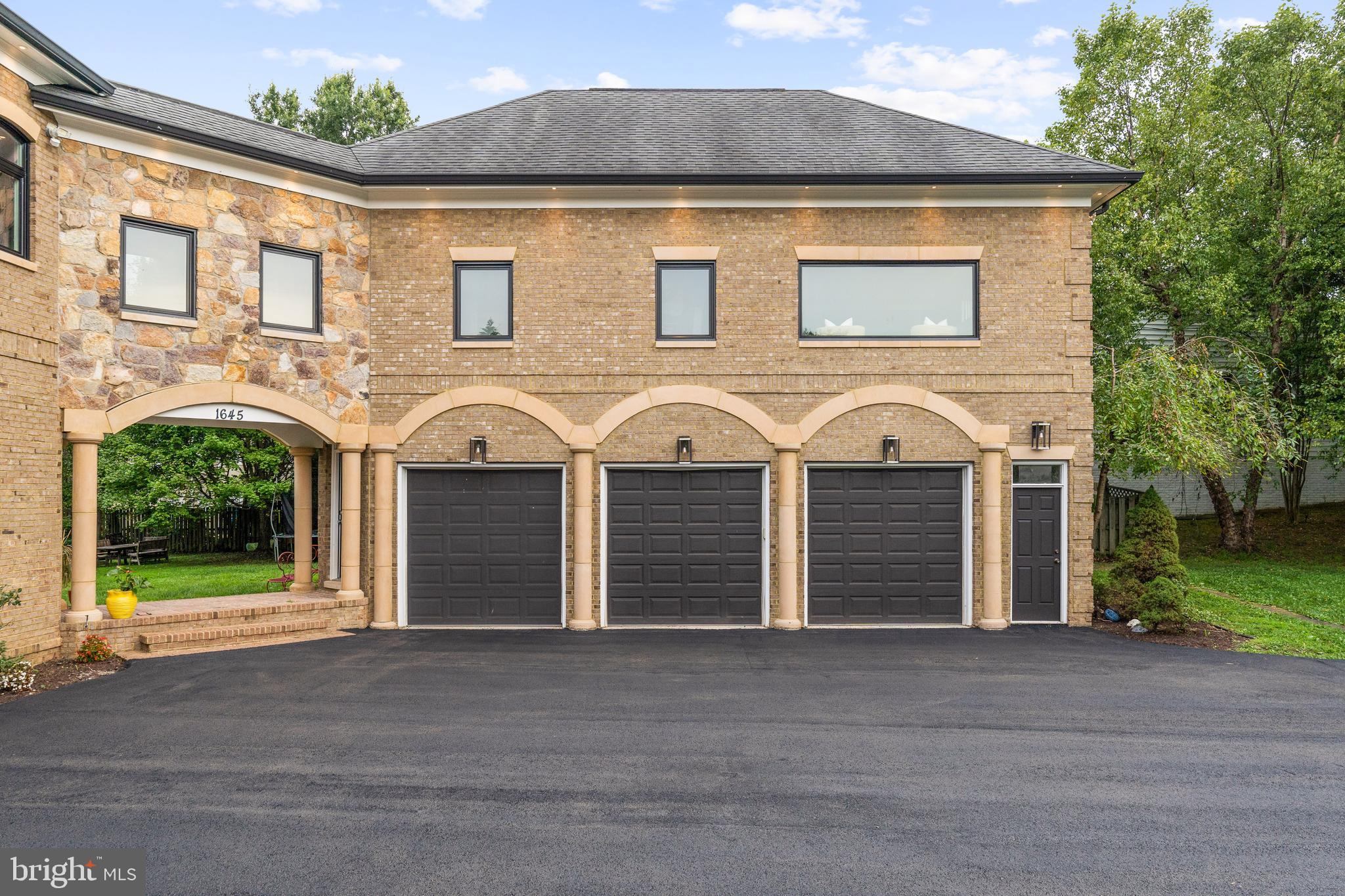 1645 Kirby Road McLean, VA 22101 - Photo 85 of 102 Three-car garage with storage cabinets