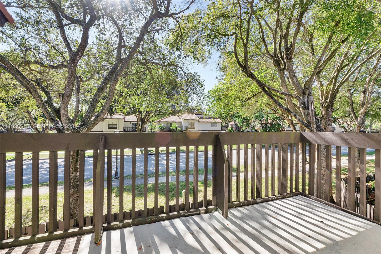 13234 Southwest 111th Terrace, Unit 44 Miami, FL 33186 - Photo 22 of 29 a view of a wooden fence