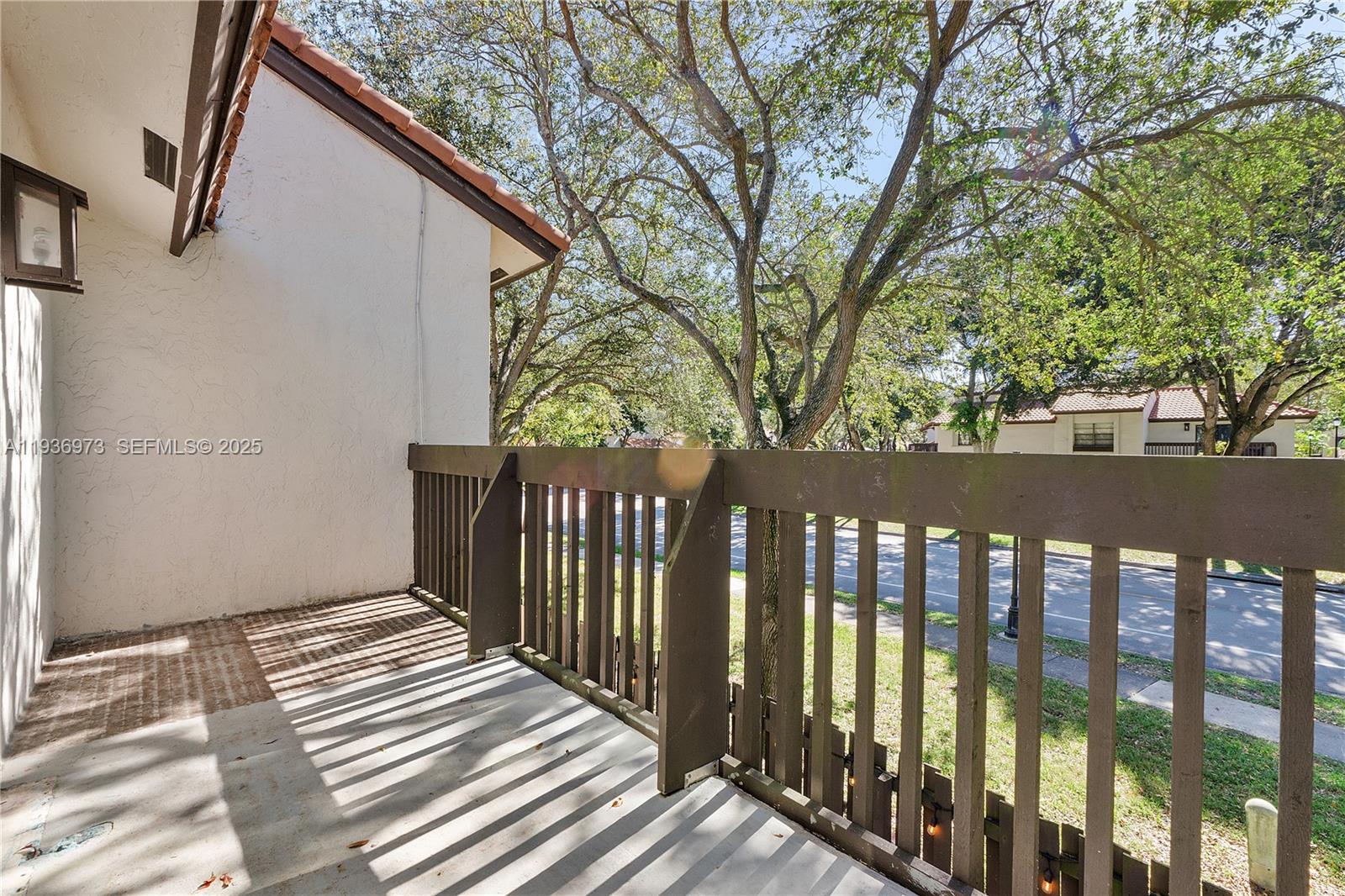 13234 Southwest 111th Terrace, Unit 44 Miami, FL 33186 - Photo 23 of 29 a view of a wooden fence