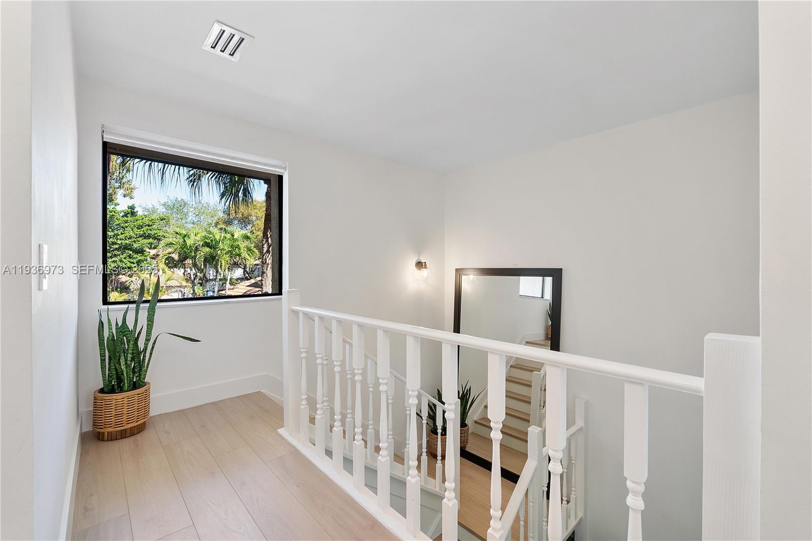 13234 Southwest 111th Terrace, Unit 44 Miami, FL 33186 - Photo 6 of 29 a view of hallway with stairs