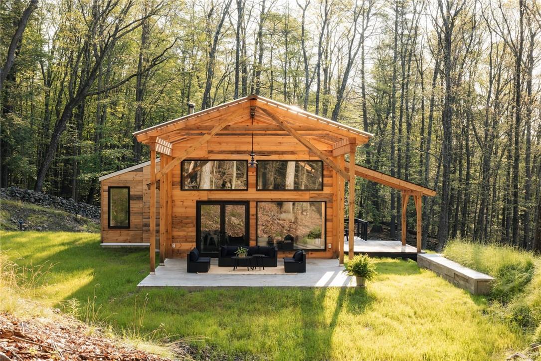 Side of house showing covered pavilion