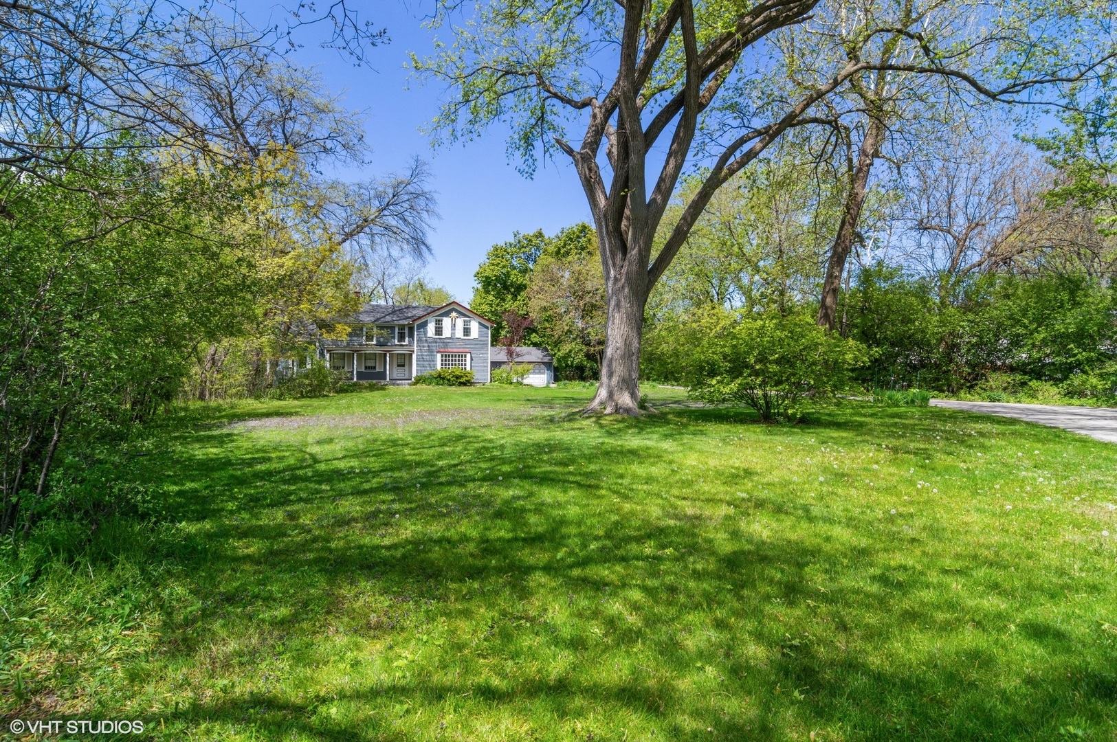 1013 Prairie Lawn Road Glenview, IL 60025 - Photo 4 of 5 a view of a yard with a tree
