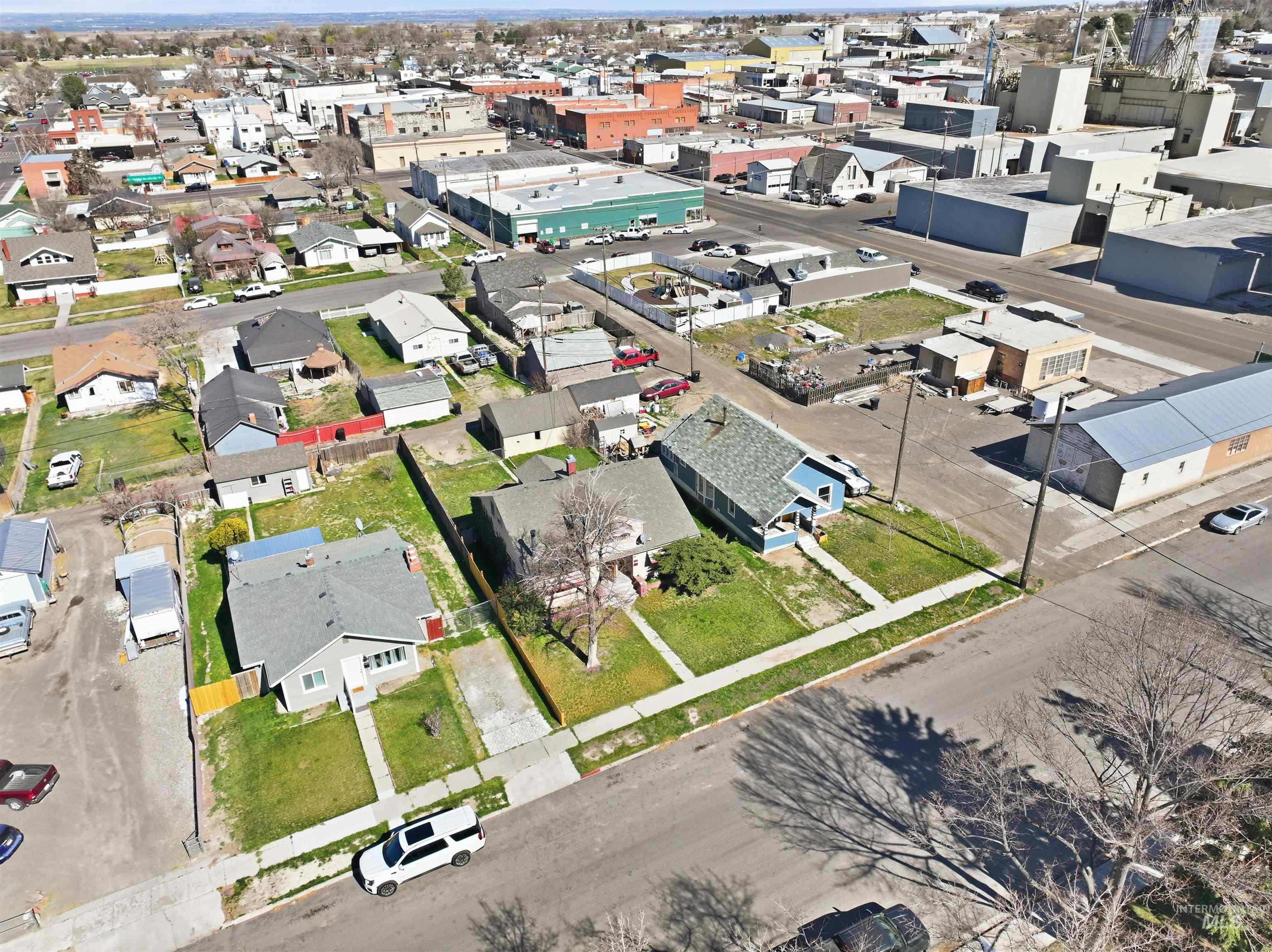 116 13th Avenue North Buhl, ID 83316 - Photo 28 of 37 Aerial perspective of suburban area featuring an industrial area