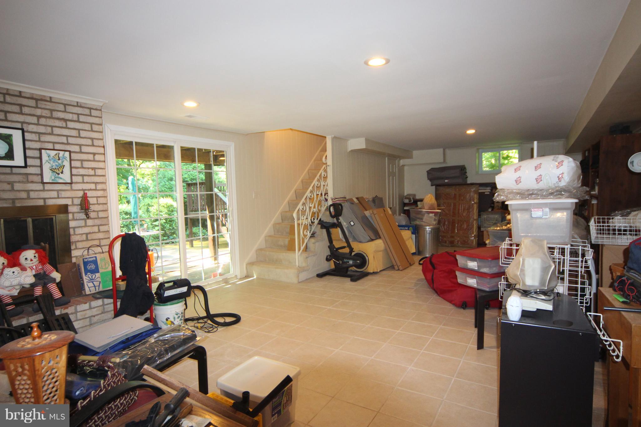 8109 Langbrook Road Springfield, VA 22152 - Photo 11 of 20 Finished Walkout Rec Room w/Fireplace