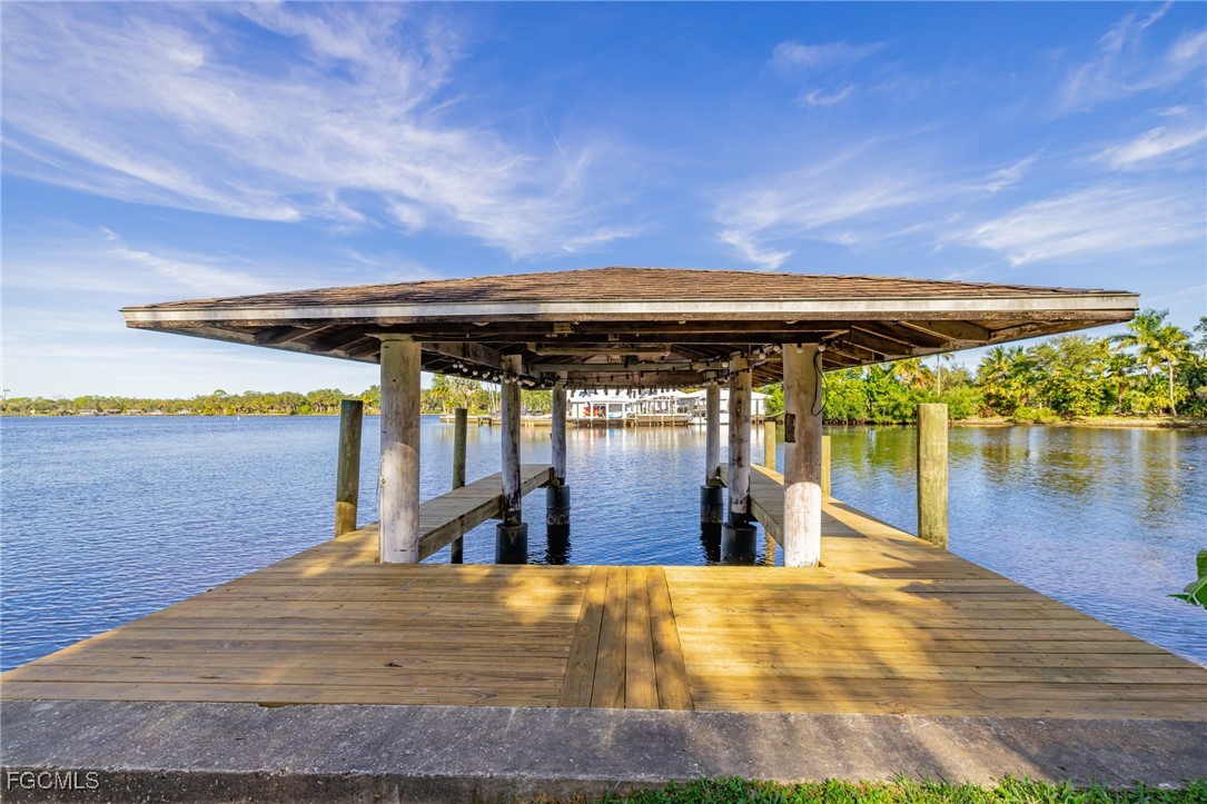 14502 Riverside Drive Fort Myers, FL 33905 - Photo 23 of 33 a view of a swimming pool with an outdoor seating