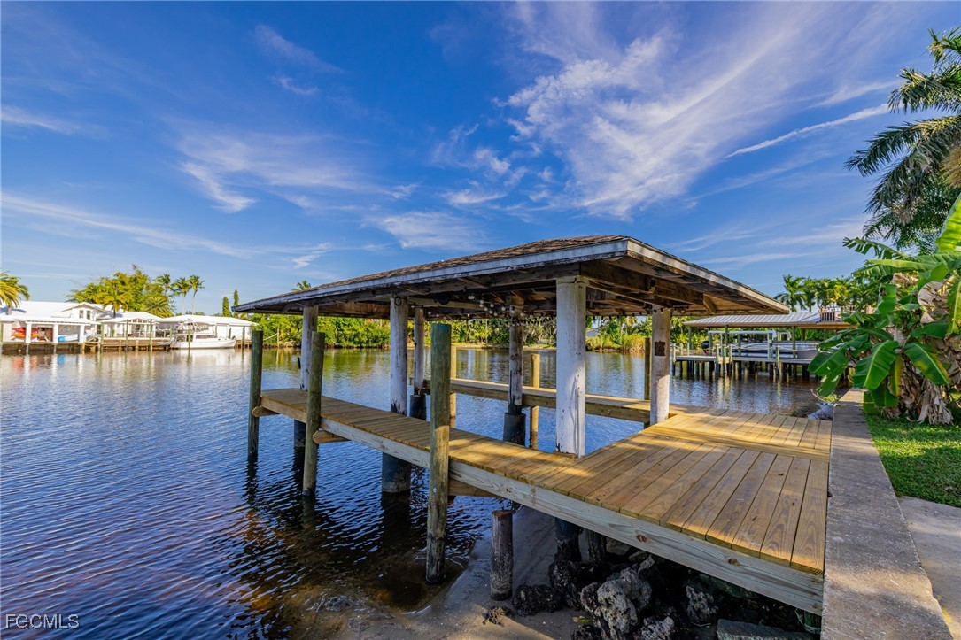 14502 Riverside Drive Fort Myers, FL 33905 - Photo 24 of 33 a view of a house with pool and wooden floor