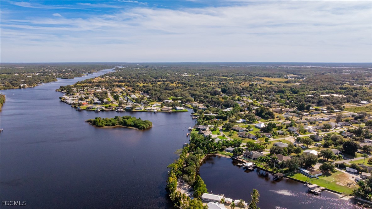 14502 Riverside Drive Fort Myers, FL 33905 - Photo 28 of 33 an aerial view of a house with a lake view