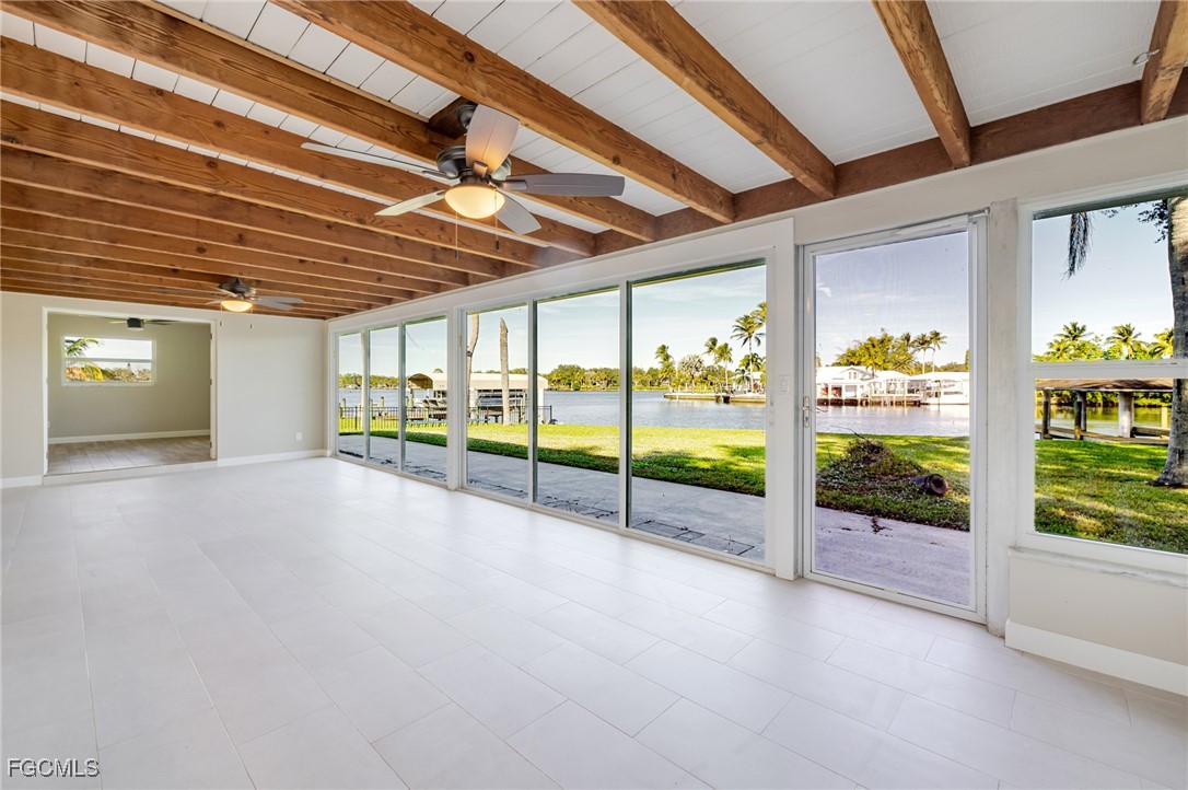14502 Riverside Drive Fort Myers, FL 33905 - Photo 3 of 33 a view of an empty room with windows