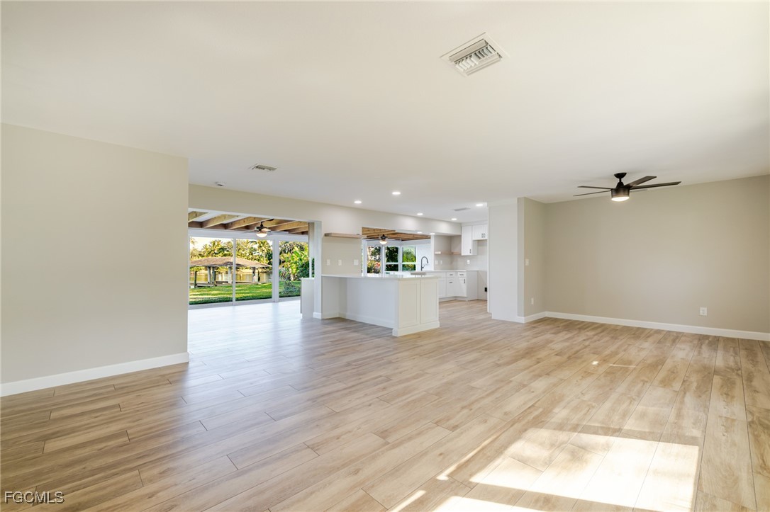 14502 Riverside Drive Fort Myers, FL 33905 - Photo 4 of 33 a view of a kitchen with a sink and a window