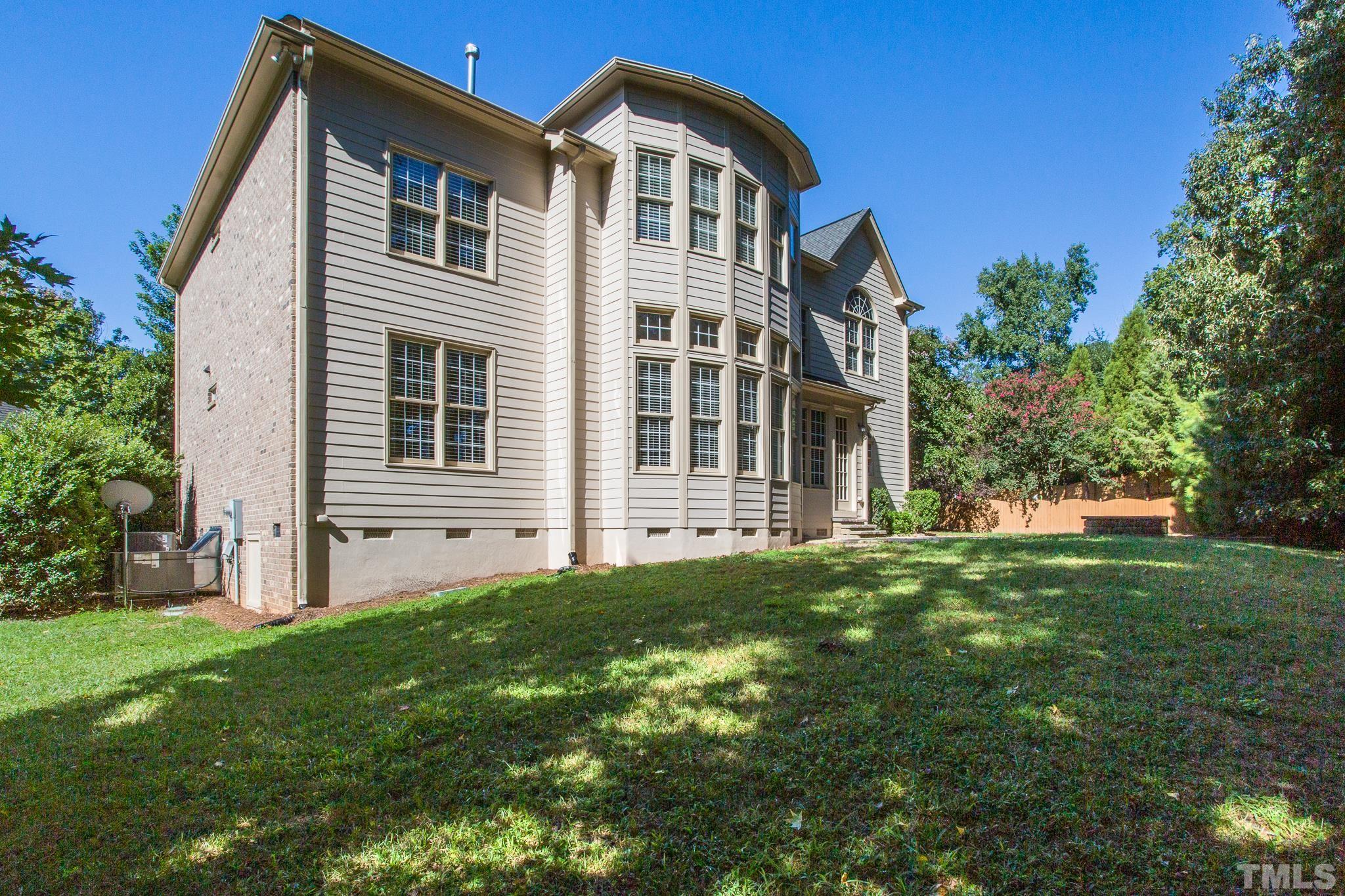 12008 Joseph Drive Raleigh, NC 27614 - Photo 5 of 25 Hardwood floors, crown molding, chair rail, wainscoting and plantation shutters.