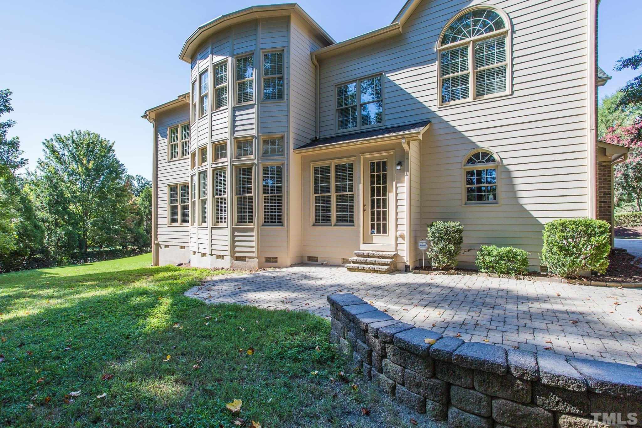 12008 Joseph Drive Raleigh, NC 27614 - Photo 6 of 25 Curved back wall for architectural interest, stone fireplace and double bookcases. New carpet!