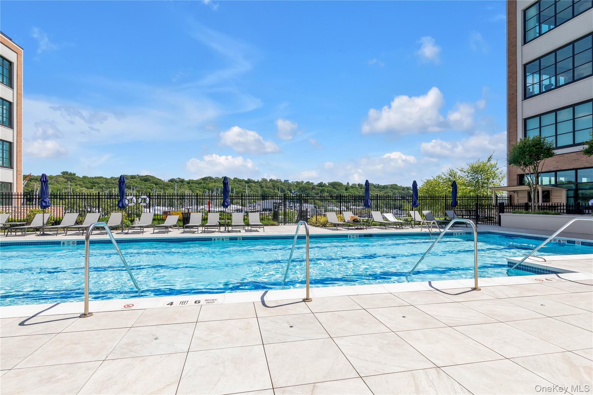 100 Garvies Point Road, Unit 1238 Glen Cove, NY 11542 - Photo 11 of 41 a view of an outdoor space and seating area