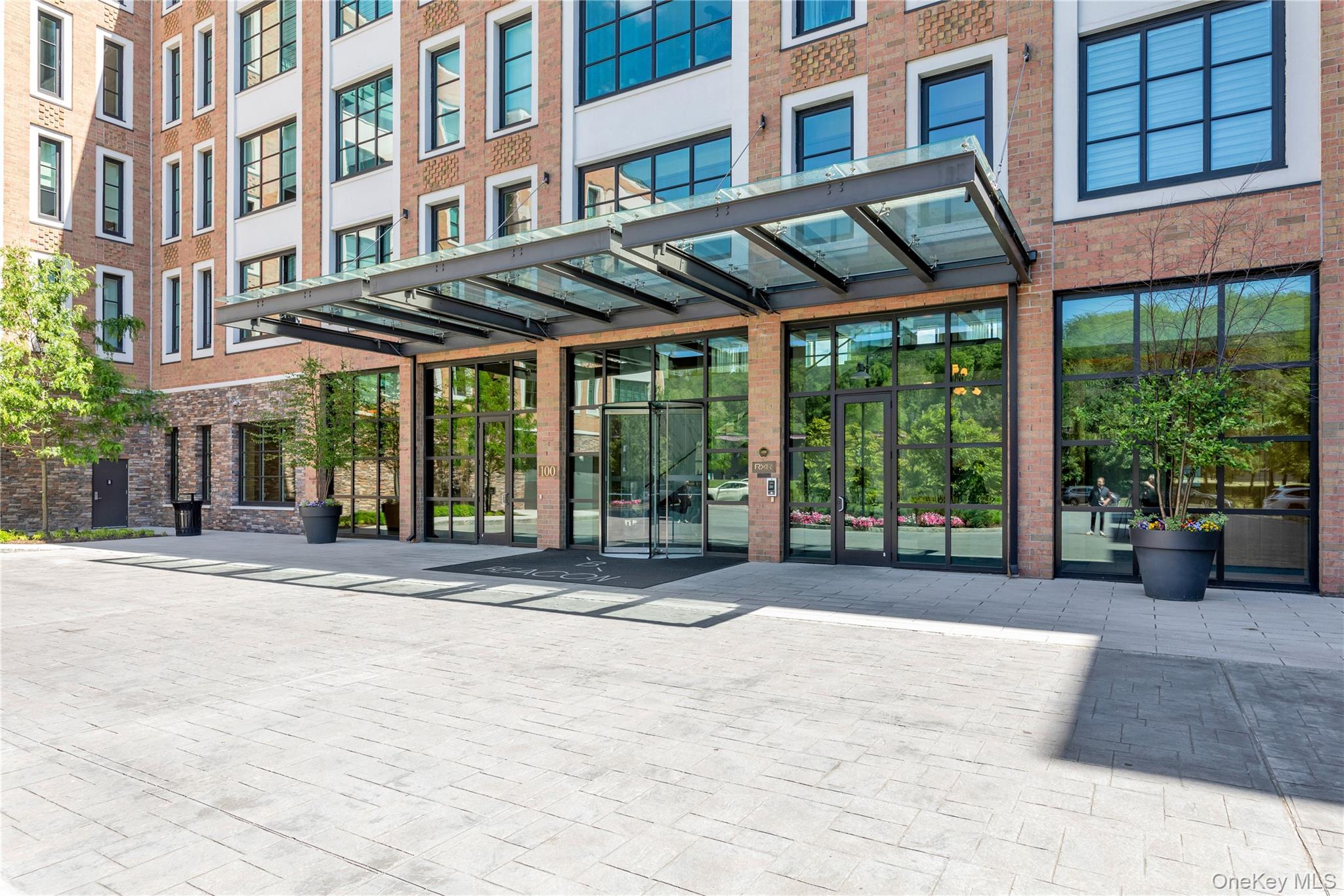 100 Garvies Point Road, Unit 1238 Glen Cove, NY 11542 - Photo 2 of 41 a house view with outdoor space