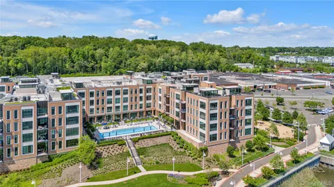 a front view of a building with garden