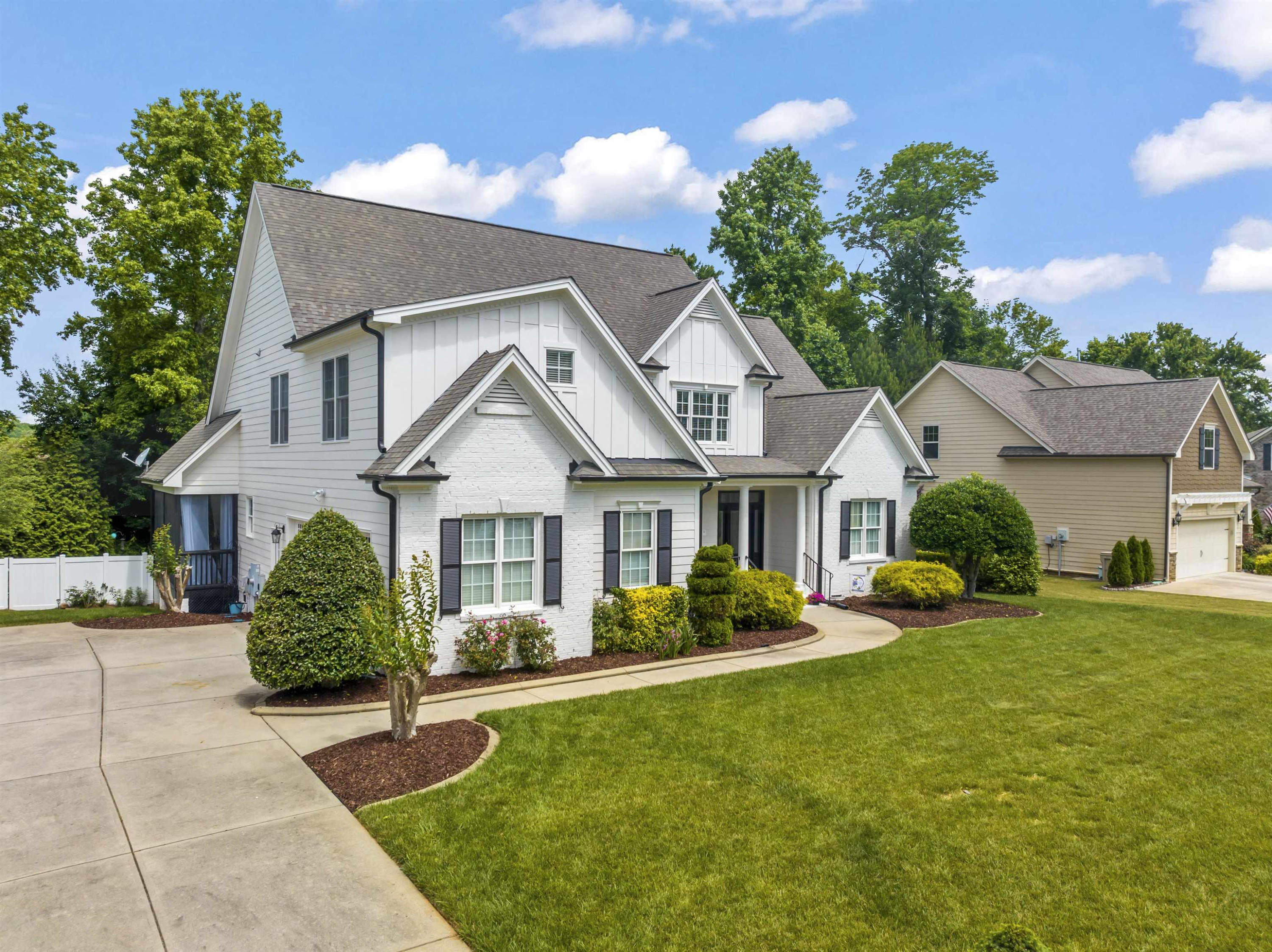 413 Waterville Street Raleigh, NC 27603 - Photo 5 of 60 a front view of a house with garden