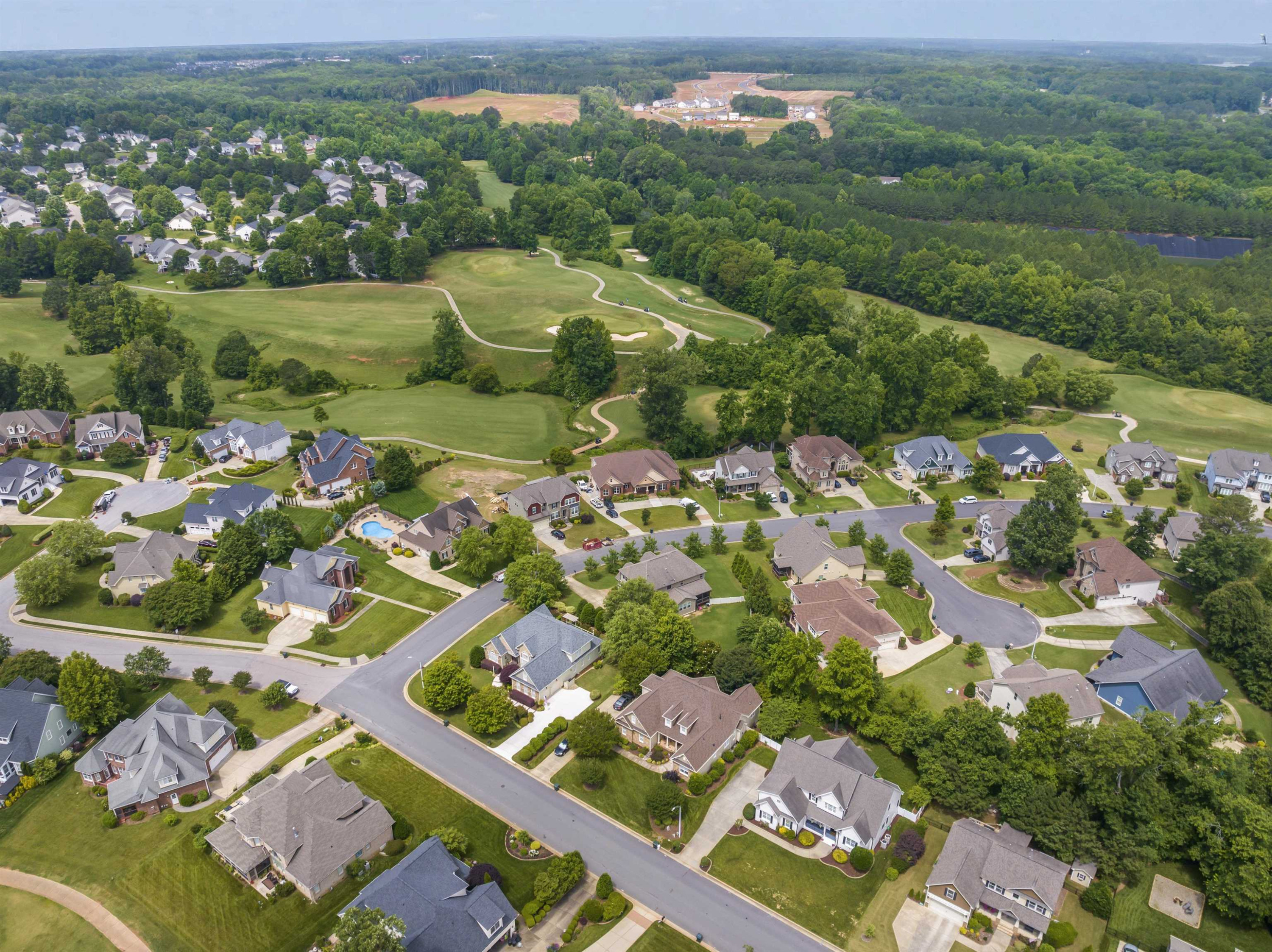 413 Waterville Street Raleigh, NC 27603 - Photo 54 of 60 an aerial view of residential houses with outdoor space