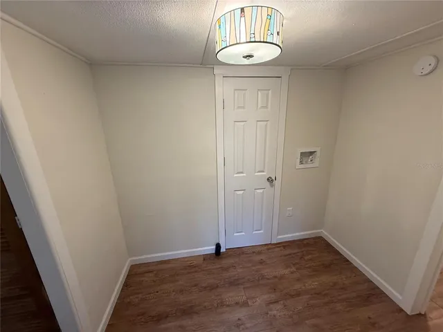 a kitchen with a refrigerator a stove top oven a sink and dishwasher